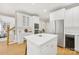 Bright kitchen featuring stainless steel appliances and a large island at 4120 St Timms Ct, Charlotte, NC 28226