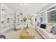 Light-filled living room with built-in shelves and ample natural light at 4120 St Timms Ct, Charlotte, NC 28226