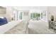 Bright main bedroom featuring a sitting area and large windows at 4120 St Timms Ct, Charlotte, NC 28226