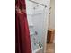 Bathroom with shower/tub combo and updated vanity at 414 S Yadkin Ave, Spencer, NC 28159