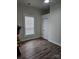 Bedroom with hardwood floors and closet at 414 S Yadkin Ave, Spencer, NC 28159