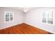 Bedroom with hardwood floors and plantation shutters at 4308 Glenfall Ave, Charlotte, NC 28210