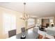 Dining room with hardwood floors and chandelier at 4308 Glenfall Ave, Charlotte, NC 28210