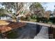 Driveway with mature tree and walkway at 4308 Glenfall Ave, Charlotte, NC 28210