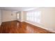 Living room with hardwood floors and large windows at 4308 Glenfall Ave, Charlotte, NC 28210