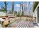 Wooden deck with fire pit and wooden railing at 4452 Huntington Dr, Gastonia, NC 28056