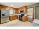 Kitchen with wood cabinets, stainless steel appliances, and tile floor at 4452 Huntington Dr, Gastonia, NC 28056