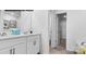 Double vanity bathroom with a soaking tub and access to a walk-in closet at 453 Court House Ave, York, SC 29745