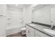 This bathroom features a tub-shower, double vanity, and vinyl floors at 4618 Harris Elliot Rd, Lincolnton, NC 28092