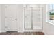 Bathroom featuring a glass shower and white door at 4618 Harris Elliot Rd, Lincolnton, NC 28092
