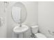 Clean bathroom featuring a toilet, sink, mirror and white walls at 4618 Harris Elliot Rd, Lincolnton, NC 28092
