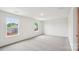 Bright, carpeted bedroom with large windows that offer a bright, airy space at 4618 Harris Elliot Rd, Lincolnton, NC 28092