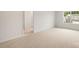 Well-lit bedroom featuring neutral wall-to-wall carpeting at 4618 Harris Elliot Rd, Lincolnton, NC 28092