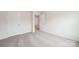 This bedroom features neutral walls, carpeted floors, a closet, and a door to the hallway at 4618 Harris Elliot Rd, Lincolnton, NC 28092