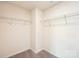 Walk-in closet features wire shelving and neutral walls at 4618 Harris Elliot Rd, Lincolnton, NC 28092