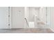 Light and airy hallway with carpet flooring and white walls at 4618 Harris Elliot Rd, Lincolnton, NC 28092