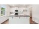 Modern kitchen with stainless steel appliances, a central island, and sleek cabinets for an ideal culinary space at 4618 Harris Elliot Rd, Lincolnton, NC 28092