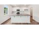 Bright kitchen with white cabinets, stainless steel appliances, and a center island, perfect for cooking at 4618 Harris Elliot Rd, Lincolnton, NC 28092