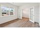 Bright office space featuring wood floors, white walls, and glass doors at 4618 Harris Elliot Rd, Lincolnton, NC 28092