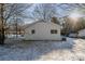 House exterior; white brick, snow-covered yard at 520 Waddell Dr, Albemarle, NC 28001