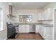 Modern kitchen featuring stainless steel appliances and granite countertops at 520 Waddell Dr, Albemarle, NC 28001