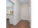 Small laundry room with wood-look flooring and space for a washer and dryer at 520 Waddell Dr, Albemarle, NC 28001