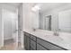 Bathroom boasts double sinks, neutral gray cabinets, white counters, and ceramic tile floors at 545 Shallowford Dr, Rock Hill, SC 29732