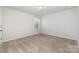 Bedroom featuring neutral walls, carpet, a ceiling light, and a window at 545 Shallowford Dr, Rock Hill, SC 29732