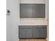 Gray cabinetry with ample storage space featuring stylish hardware and backsplash at 545 Shallowford Dr, Rock Hill, SC 29732