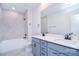 Bathroom with double vanity, gray cabinets, and a large shower at 558 Edmunds Ln # 41, Clover, SC 29710