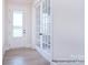 Bright entryway with hardwood floors and French doors at 558 Edmunds Ln # 41, Clover, SC 29710