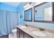 Bathroom boasts double sinks and granite countertops at 5600 Ballenger Ct, Waxhaw, NC 28173