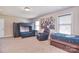 Spacious bedroom includes a bunk bed, a recliner, and a twin-size bed at 5600 Ballenger Ct, Waxhaw, NC 28173