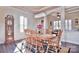 Formal dining room with wood table and chairs, chandelier at 5600 Ballenger Ct, Waxhaw, NC 28173