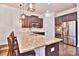 Island kitchen with granite countertops and stainless steel appliances at 5600 Ballenger Ct, Waxhaw, NC 28173