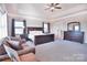 Main bedroom with sitting area and dresser at 5600 Ballenger Ct, Waxhaw, NC 28173