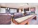 Home theater with projector, screen, and shuffleboard at 5600 Ballenger Ct, Waxhaw, NC 28173