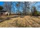 Enjoy this large backyard bordered with mature trees, providing a private and peaceful outdoor setting at 5701 Glenshire Ct, Charlotte, NC 28269