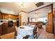 View from the dining area into the kitchen and living room of the home at 5701 Glenshire Ct, Charlotte, NC 28269