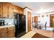 Cozy kitchen with wooden cabinets and adjacent dining area at 5701 Glenshire Ct, Charlotte, NC 28269