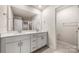 Modern bathroom with double vanity and tile flooring at 717 Windage Way, Pineville, NC 28134