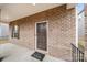 Brick front exterior with porch and entry door at 717 Windage Way, Pineville, NC 28134