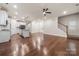 Modern kitchen with island and stainless steel appliances at 717 Windage Way, Pineville, NC 28134