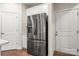 Stainless steel refrigerator in a modern kitchen setting at 717 Windage Way, Pineville, NC 28134