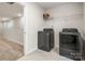 Laundry room with washer, dryer, and access to hallway at 717 Windage Way, Pineville, NC 28134