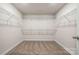 Large walk-in closet with wire shelving at 717 Windage Way, Pineville, NC 28134