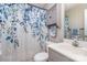 Bathroom with shower/tub combo, vanity, and floral shower curtain at 844 Turning Point Ln, Concord, NC 28027