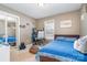 Bedroom with full-size bed, workspace, and mirrored closet at 844 Turning Point Ln, Concord, NC 28027