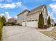 Three-car garage and expansive driveway provide ample parking space at 8509 Penton Pl, Harrisburg, NC 28075