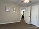 Bright bedroom with tile floors and access to kitchen at 9041 J M Keynes Dr # 10, Charlotte, NC 28262